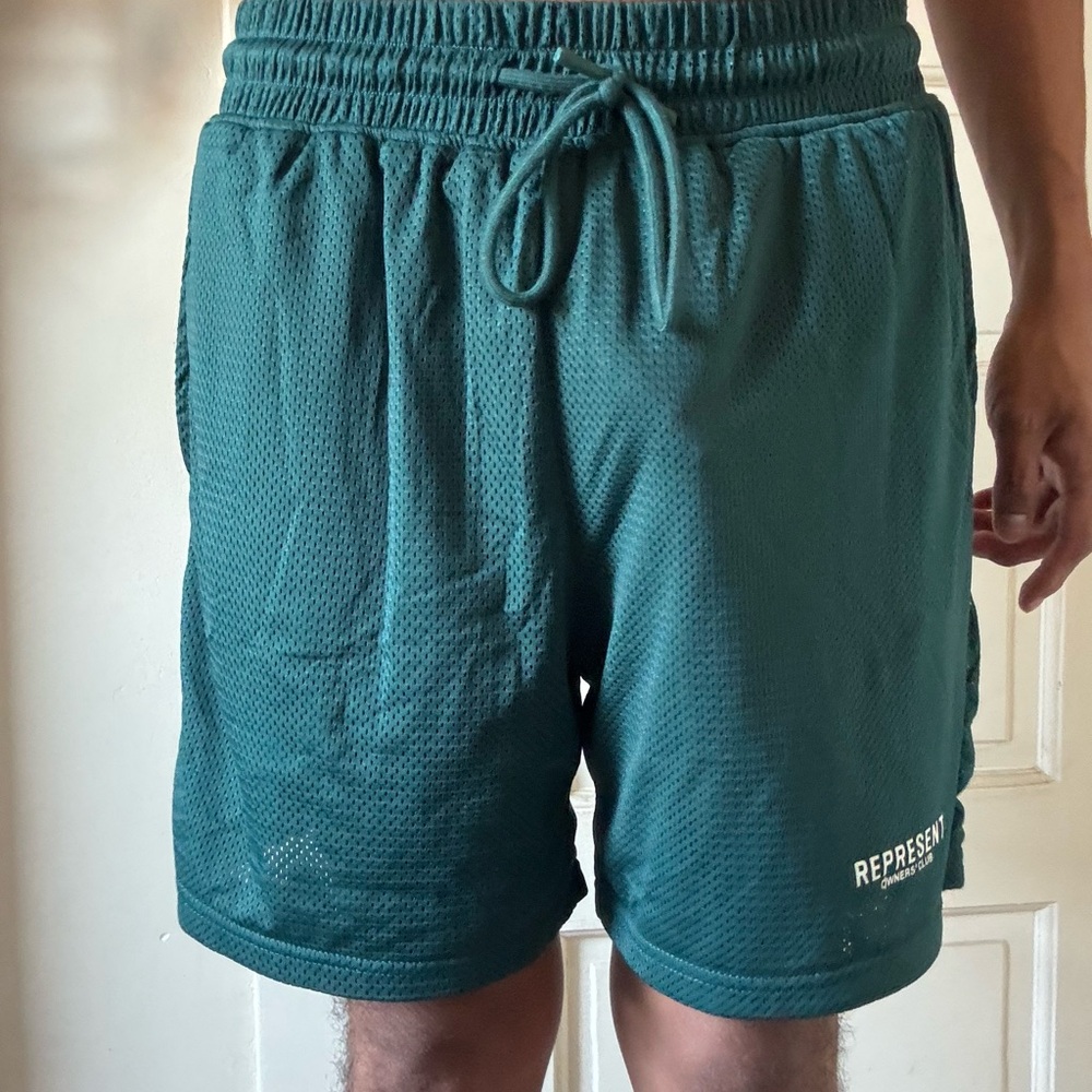 Men's Teal Athletic Shorts represent